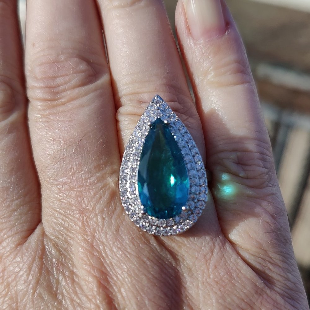 Blue/green tourmaline and white topaz ring